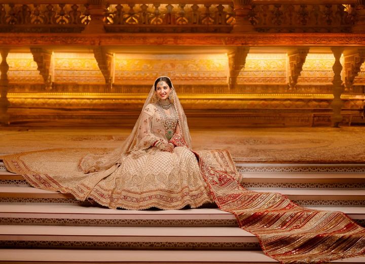 who designed radhika merchant wedding dress A look at Radhika Merchant's outfits for the Ambani pre-wedding festivities